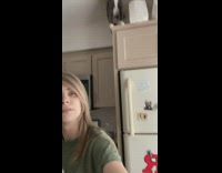 Cat jumps off counter onto owners head falls 