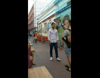 Guy fake cries for video mural gelato 