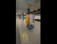 Man in wheelchair has yellow barrier 