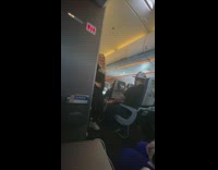 Black champion sweater dance middle of airplane 