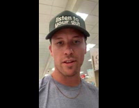 Man play with target shopping cart with side handles