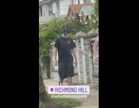 Guy black bird plague doctor mask sidewalk 