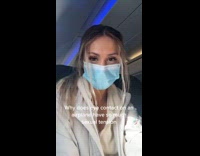 Girl makes eye contact on plane 