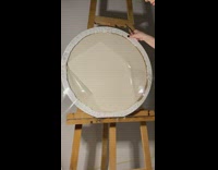 Time lapse video painting of a circular logo painting 