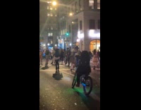 Group of roller skaters strolls on street part 2