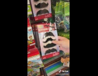 Girl buys mustaches and sunglasses for top gun