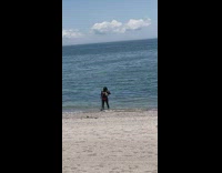 Woman in bikini tiktok dance in front of the tripod