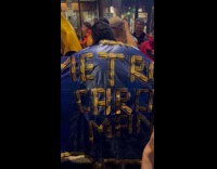 MetroCard man cape costume made of metro cards