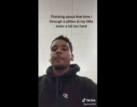 Brother throws pillow at baby sister