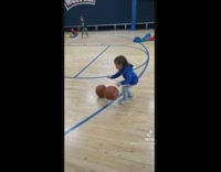 Kid Double Dribbles and Spins Ball on Finger