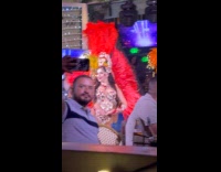 Man selfie video with sexy beach dancers 