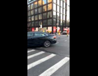 Women traffic cones costume jump rope at street