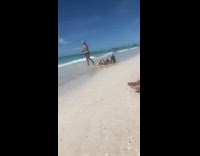 Guy film from woman bikini to beach