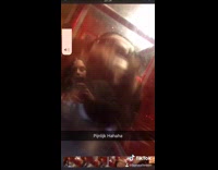 Girl falls forward over red beam bar