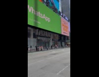 Two women walk together for street photoshoot