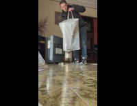 Guy flip bag to drop cat hiding inside