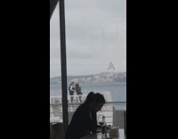 Woman holding branch bonfire