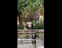 Man with pigeons on hands and shoulders