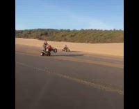 Red ATV wheelie 