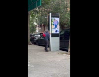 Angry man shout at Link NYC sign