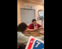 Man slams huge uno card on table 