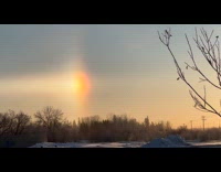Man sees sundogs in  sky