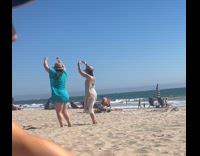 Collab IITW - Two women fedora hat dance on beach