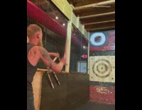 Guy bounces catches axe wall trick shot  