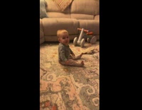 Baby wiggling toes on floor 