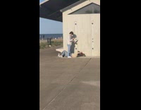 Woman white sweater red dye hair lie down photo shoot