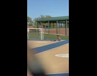 Woman long dress rollerblades soccer field music