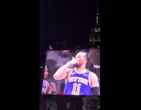 [third party - ads] Knicks fans sits on top of billboard