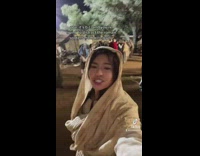 Group of people dressed in BC clothes dance modernly