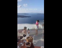 Woman pink crop top balcony pictorial wine