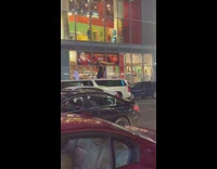 Lady dances twerks on top of car 