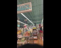 Woman orange skirt hold product mall pictorial