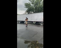 Guy riding onewheel carries girl in arms 