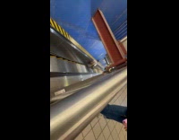 Woman goes down use the upward escalator