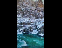 Beautiful snow covered mountain and river train