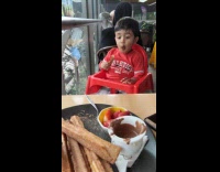 Collab PubityPets - Kid Red Shirt Enjoys its First Bite of Churro 