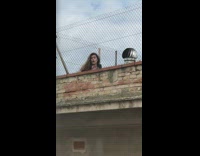 Girl rooftop tiktok roof vent fence