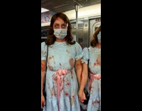 Two women dressed as twins from The Shining 
pt. 2