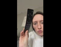 Woman angrily complaining about tv remote