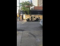 Girl black leggings national guard military vehicle 