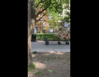 Hoverboard pulls cart stacked cardboard boxes 