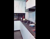 Blue skirt girl mixes raspberry cocktail drink 