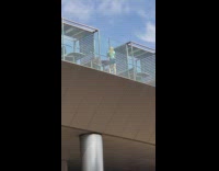 Woman in green top tiktok dance by the balcony