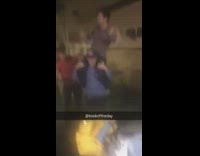 yellow backpack piggy back surfboard kid falls off friends shoulders