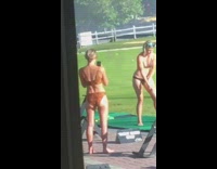 Woman black bikini play golf photo shoot