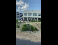 Two kids shoot music video empty public park